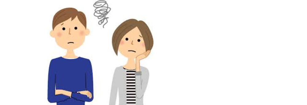 困った顔の人